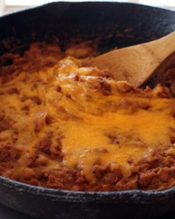 Easy, peasy, beans and cheesy! Why buy them when you can make them 10 times better yourself? Get our recipe for Homemade Refried Beans here.