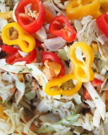 Fresh & colorful, this spicy and crunchy Jamaican Slaw Recipe is a flavor-packed side dish. Sweet and bright peppers with healthy cabbage.