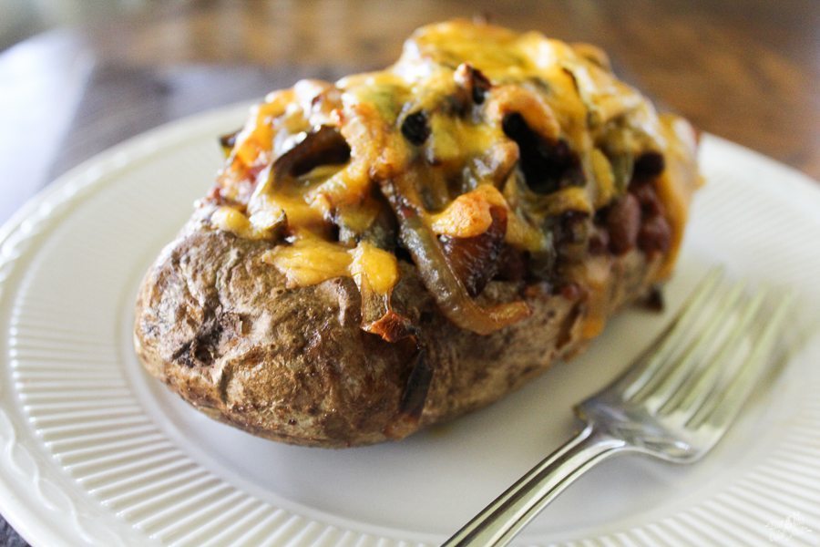 Cheesy Chili Potato Bowls with Grilled Onions and Peppers