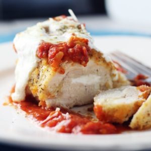 Topped with marinara and melted fresh mozzarella, this baked chicken parmesan is a wonderful dinner recipe.