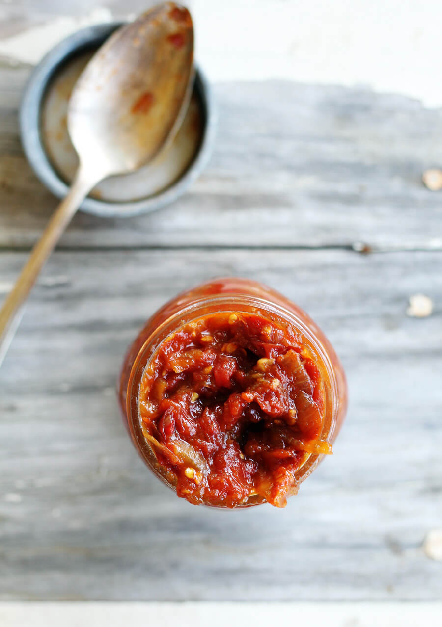 Sweet + savory with a kick of spice, with roasted ripe tomatoes and caramelized onions, this Roasted Tomato Jam is a tasty topping to serve with all your summer meals.