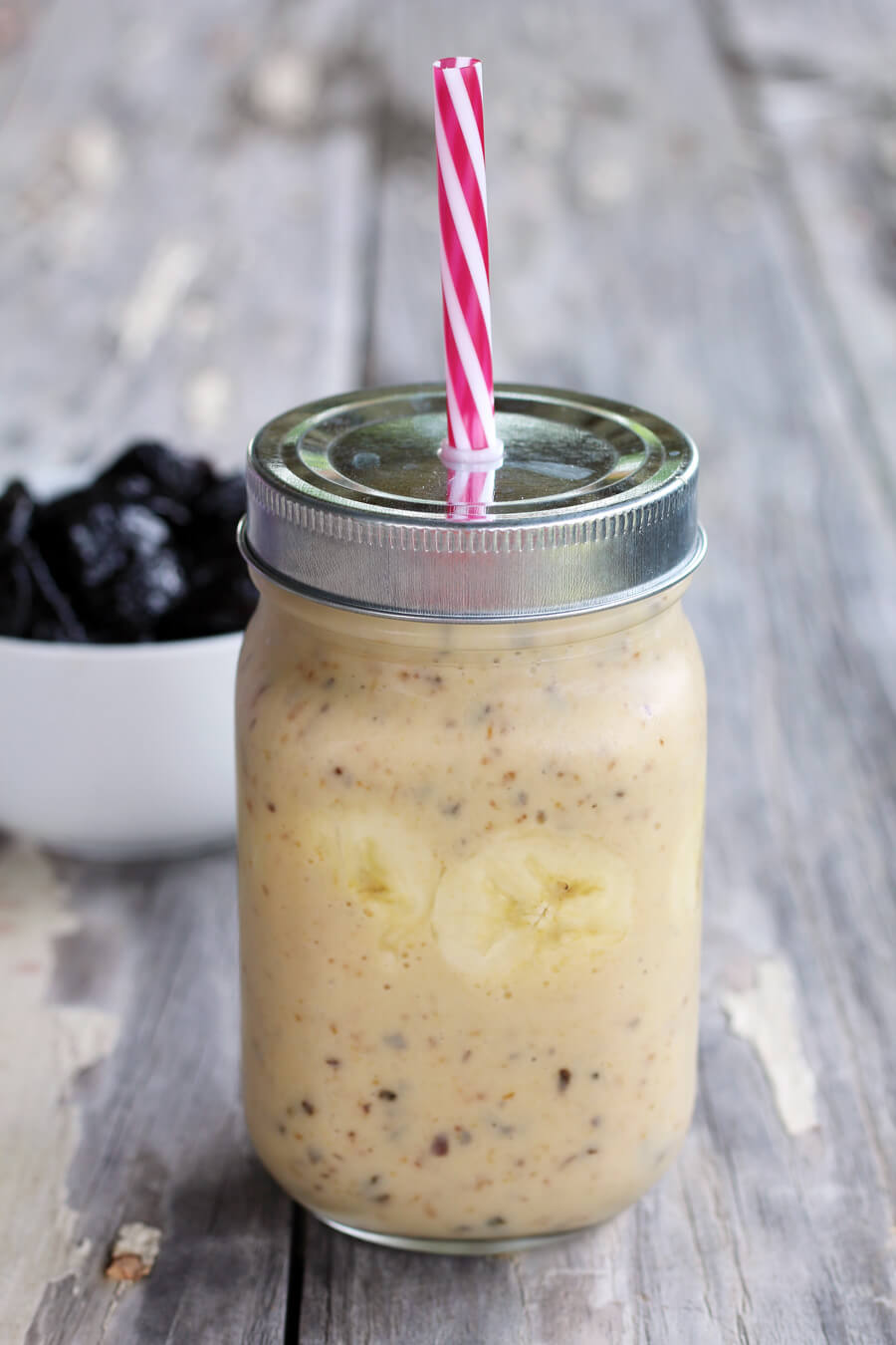TWO yummy breakfast smoothie recipes: Banana Pineapple and Mango Berry. Full of fruit and wholesome ingredients, these refreshing morning smoothies are a boost of morning energy.