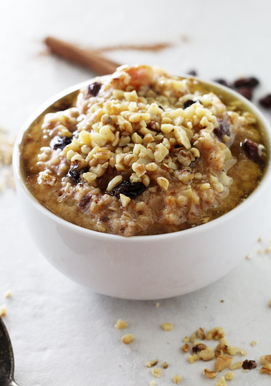 You are going to love this wholesome and satisfying recipe for Apple + Walnut Steel Cut Oatmeal. Whole grains simmered with fresh apples and cinnamon and topped with crunchy walnuts, honey and butter.