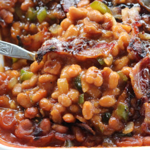Tangy-sweet baked beans loaded with bite after bite of savory-salty bacon.