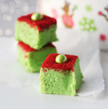 festive green and red white chocolate fudge with a seasonal holiday background with sparkling lights